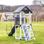 Carebear-Castle-Hero-Swing-Set-16X9-3-768×432-1.png